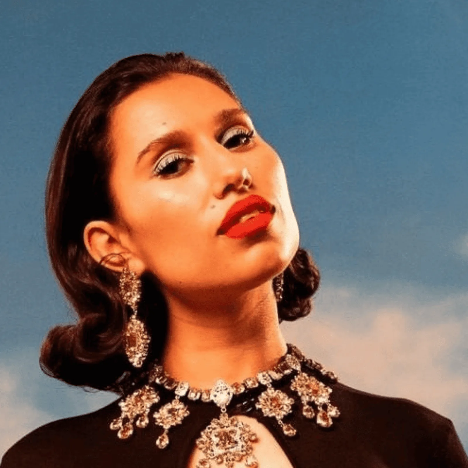 LXURI Culture - What Makes Raye the Voice of a Generation? Here’s the Scoop.