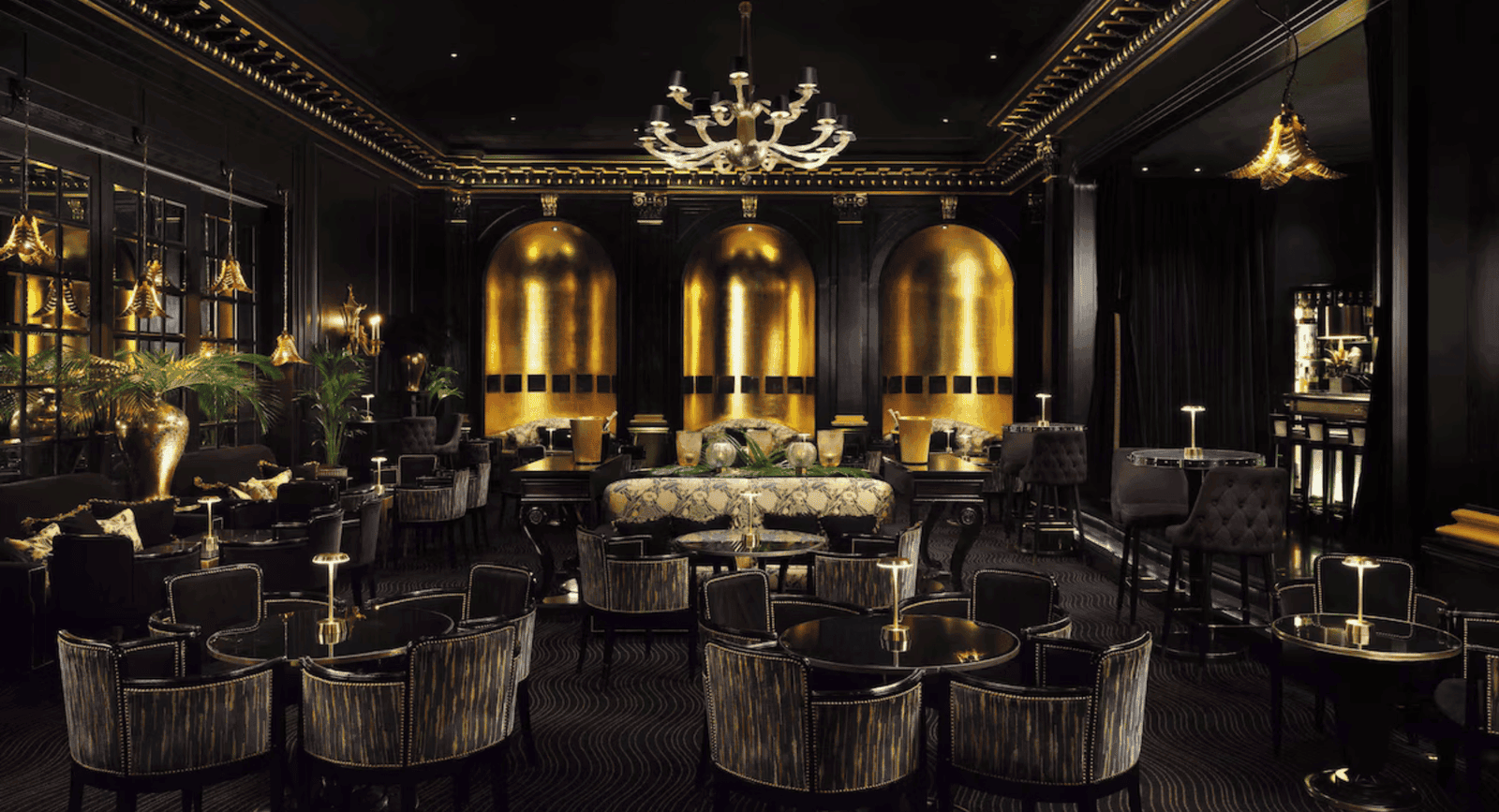 LXURI - The bartenders at The Savoy craft an Old Fashioned with precision.