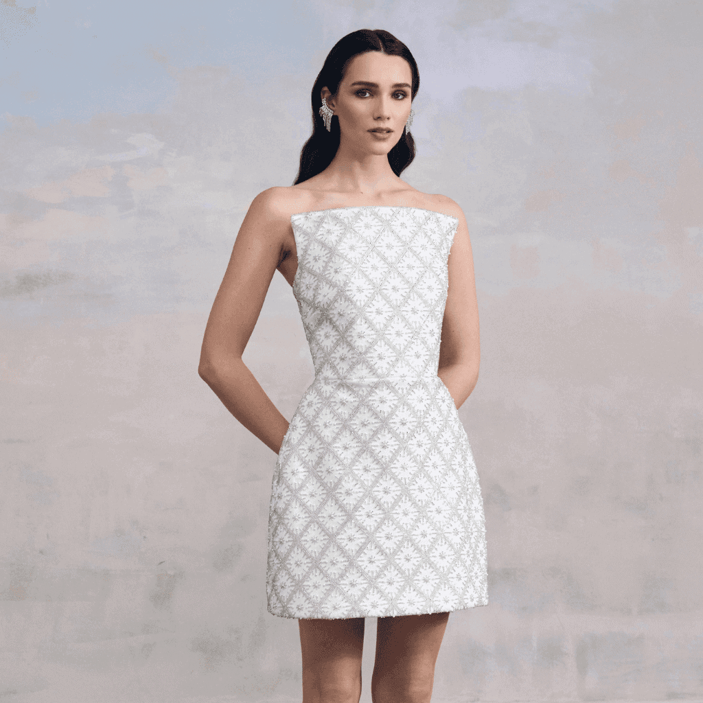 LXURI - Bridal mini dress with tailored fit and elegant embellishments by NADINE MERABI