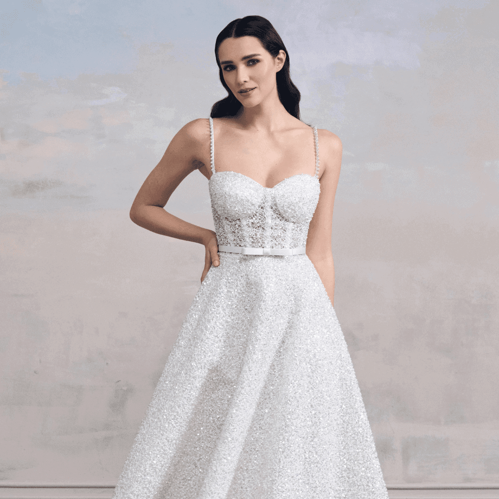 Modern bridal gown with sleek silhouette and refined detailing By NADINE MERABI | LXURI