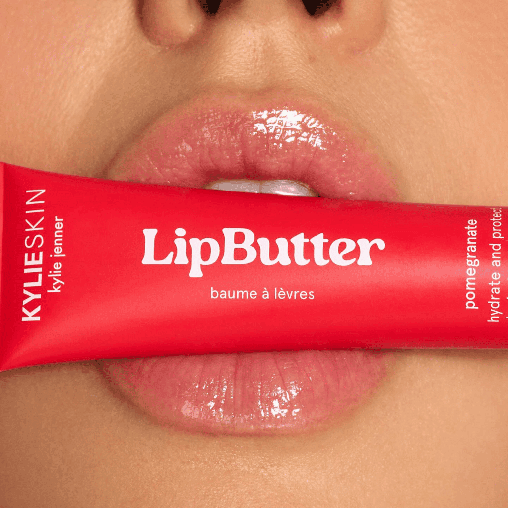 LXURI - Kylie Cosmetics Lip Butter with sheer shine on lips.